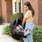 A mom is carrying her baby in the Baby Trend EZ-Lift PLUS Infant Car Seat