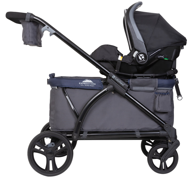 Baby Trend Expedition 2-in-1 Stroller Wagon side view with infant car seat carrier