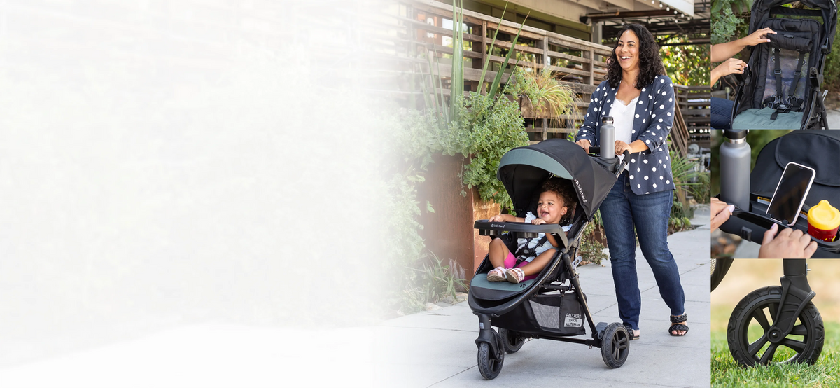 A mom is pushing her child in the Baby Trend Passport Seasons All-Terrain Stroller