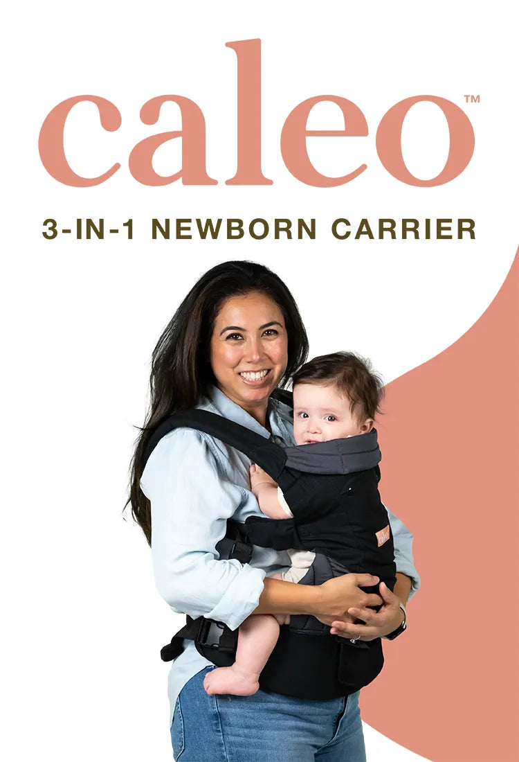 A mom carrying her child using the Baby Trend Caleo soft carrier